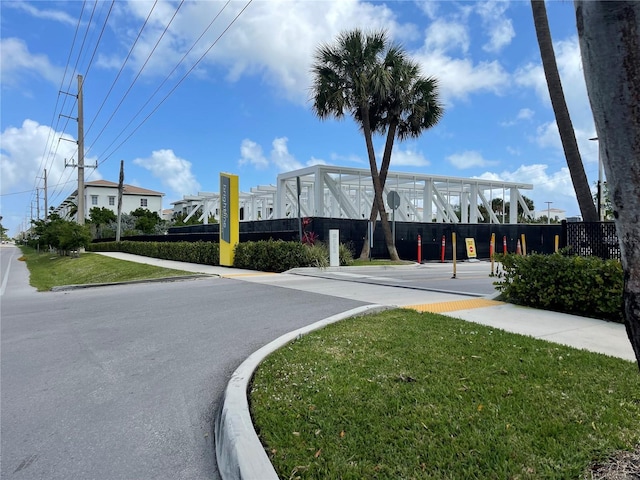 19440 NE 26th Ave Unit 53B, Miami, FL 33180 - view of asphalt road featuring curbs