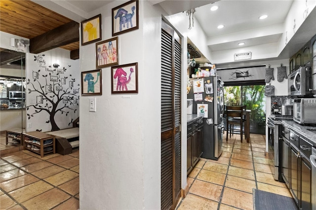 19440 NE 26th Ave Unit 53B, Miami, FL 33180 - kitchen featuring appliances with stainless steel finishes, recessed lighting, and stone tile flooring