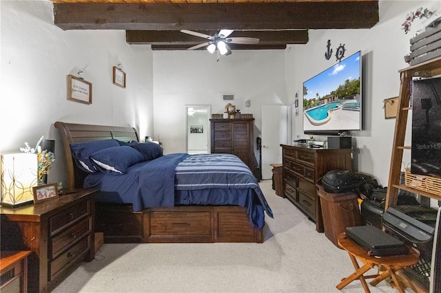 19440 NE 26th Ave Unit 53B, Miami, FL 33180 - bedroom with beamed ceiling and light carpet