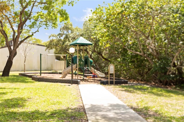 19440 NE 26th Ave Unit 53B, Miami, FL 33180 - community play area featuring a lawn