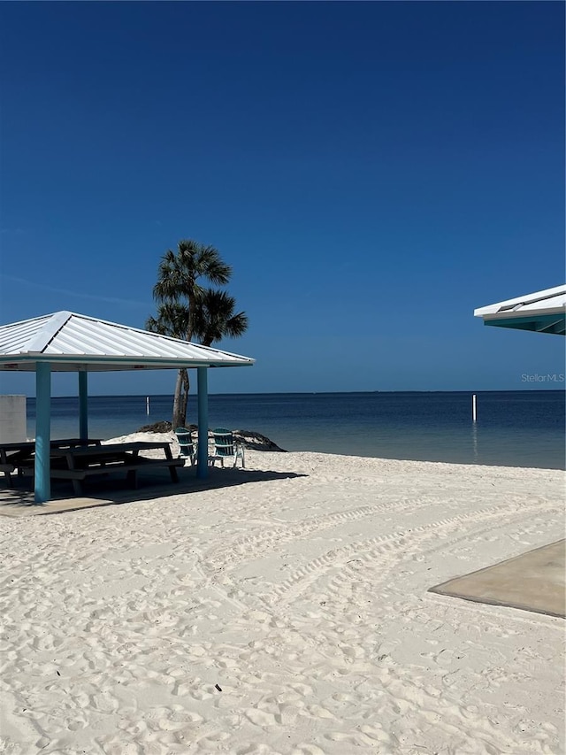 property view of water featuring a view of the beach