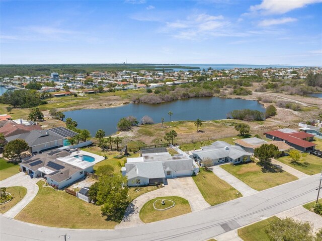 bird's eye view with a water view and a residential view