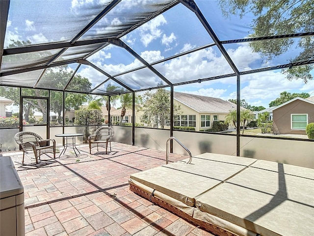 view of patio with a lanai