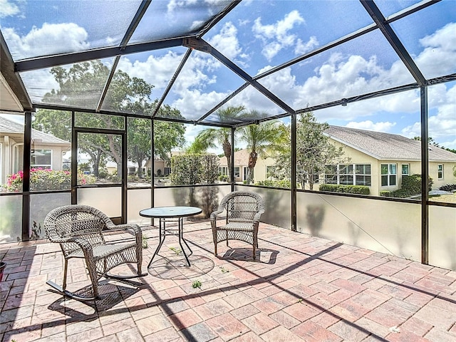 view of patio with a lanai