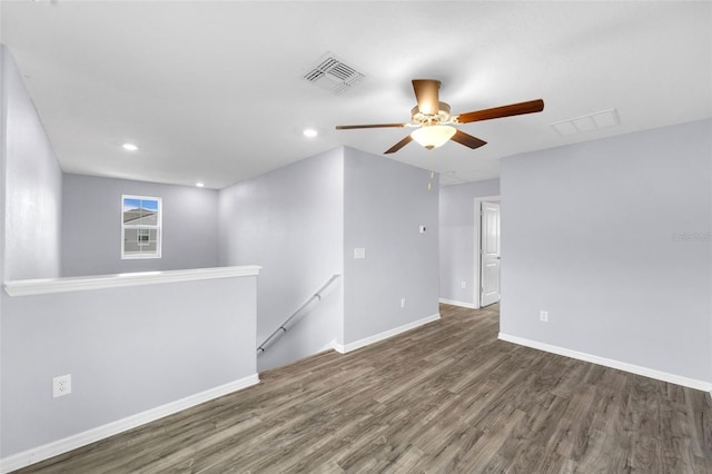 582 Royal Empress Dr, Ruskin, FL 33570 - spare room featuring wood finished floors, a ceiling fan, and recessed lighting