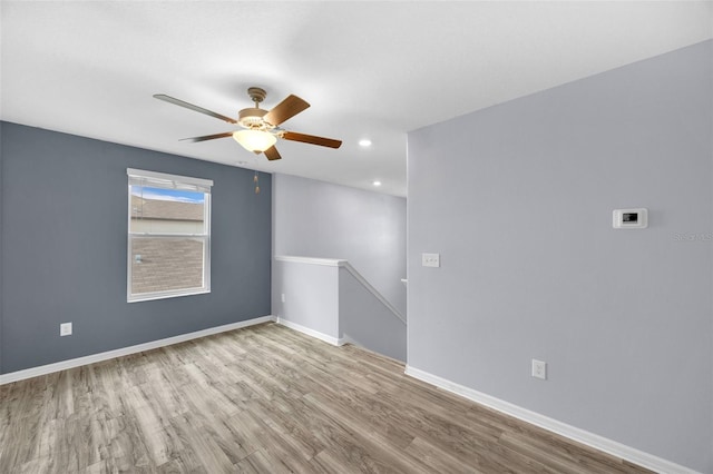 582 Royal Empress Dr, Ruskin, FL 33570 - unfurnished room with a ceiling fan, wood finished floors, and recessed lighting