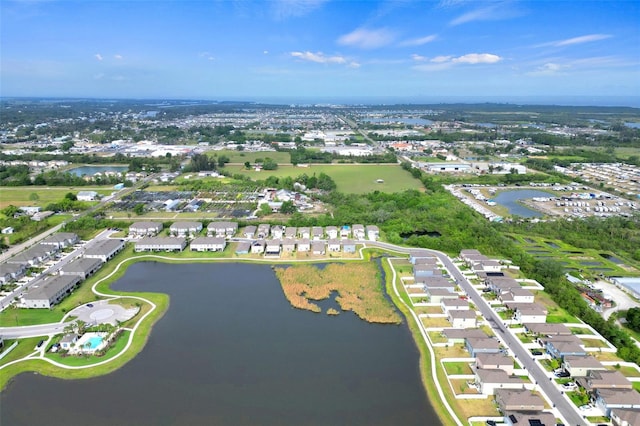 582 Royal Empress Dr, Ruskin, FL 33570 - aerial view of property's location featuring a large body of water and nearby suburban area