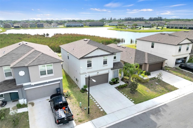582 Royal Empress Dr, Ruskin, FL 33570 - aerial perspective of suburban area featuring a nearby body of water