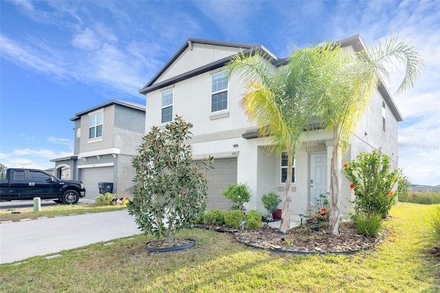 582 Royal Empress Dr, Ruskin, FL 33570 - traditional-style house with an attached garage, stucco siding, a front yard, and concrete driveway