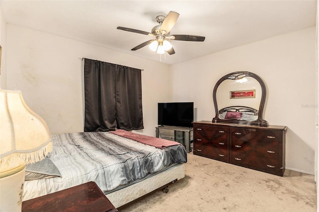 carpeted bedroom featuring a ceiling fan