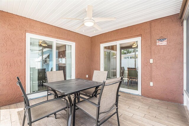 view of patio / terrace featuring outdoor dining space and ceiling fan