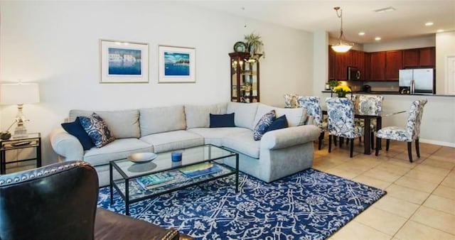 5221 Bannister Park Ln, Lithia, FL 33547 - living area featuring light tile patterned floors and recessed lighting
