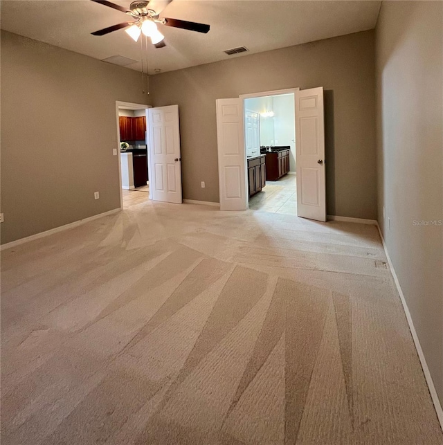 5221 Bannister Park Ln, Lithia, FL 33547 - empty room with baseboards, a ceiling fan, light colored carpet, and visible vents