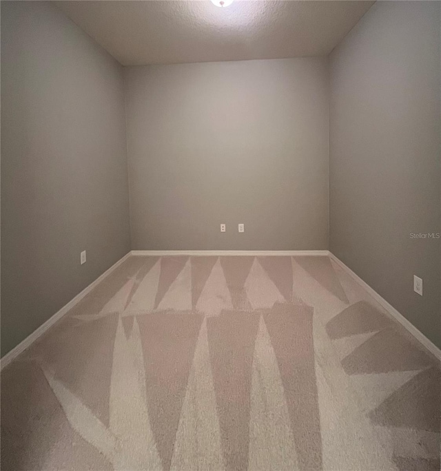 5221 Bannister Park Ln, Lithia, FL 33547 - unfurnished room with baseboards and carpet