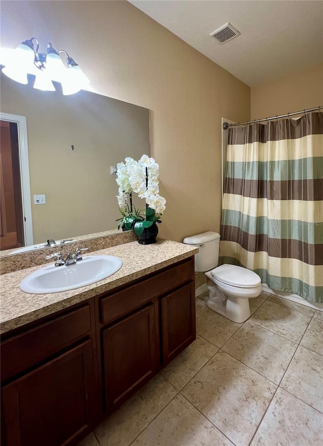 5221 Bannister Park Ln, Lithia, FL 33547 - bathroom featuring visible vents, tile patterned flooring, vanity, curtained shower, and toilet