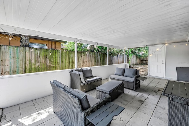 view of patio with a fenced backyard and an outdoor living space