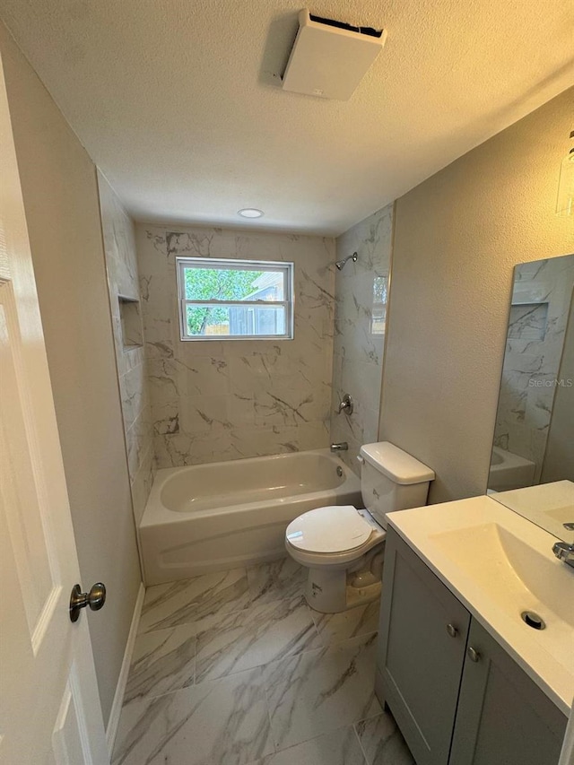 full bath featuring shower / bathing tub combination, a textured ceiling, vanity, toilet, and marble finish floor