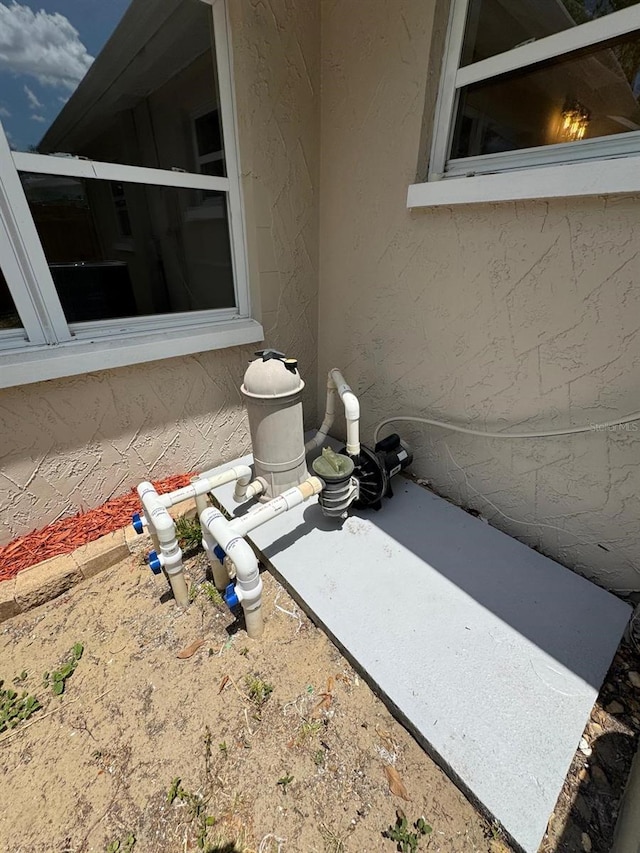 details featuring stucco siding