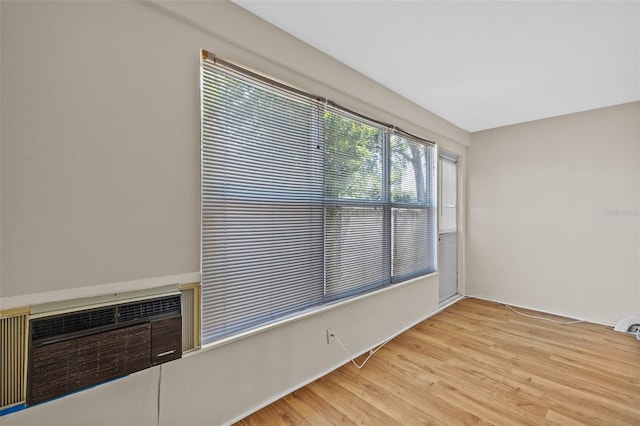 2366 Shelley St Unit 7, Clearwater, FL 33765 - unfurnished room featuring a wall mounted air conditioner and light wood finished floors