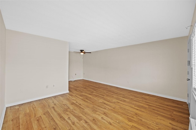 2366 Shelley St Unit 7, Clearwater, FL 33765 - unfurnished room with light wood-style floors, a ceiling fan, and baseboards