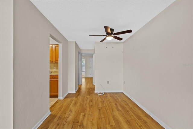 2366 Shelley St Unit 7, Clearwater, FL 33765 - interior space with baseboards, light wood-style flooring, and ceiling fan