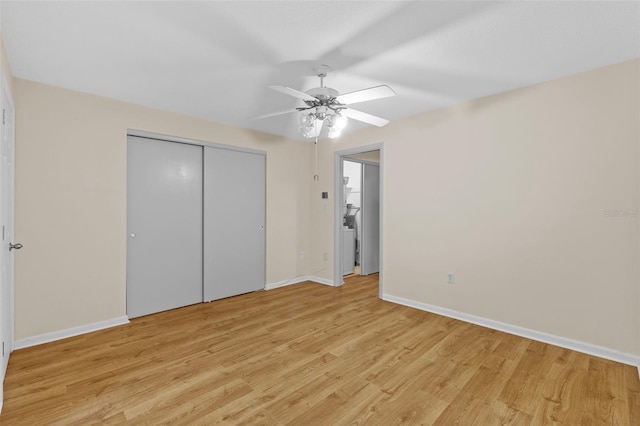 2366 Shelley St Unit 7, Clearwater, FL 33765 - unfurnished bedroom with baseboards, a ceiling fan, light wood finished floors, and a closet