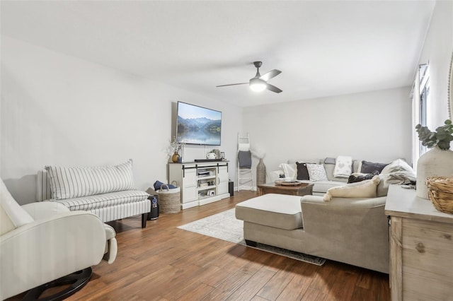 12736 Wood Trail Blvd, Tampa, FL 33625 - living area featuring a ceiling fan and wood finished floors