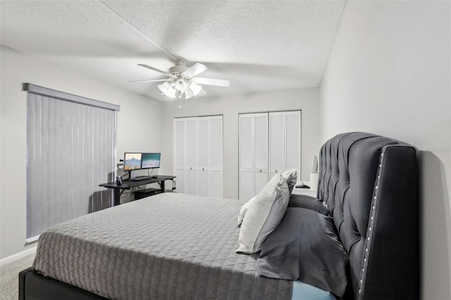 12736 Wood Trail Blvd, Tampa, FL 33625 - bedroom with carpet flooring, a textured ceiling, multiple closets, a ceiling fan, and baseboards
