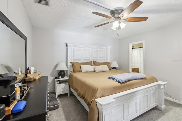 12736 Wood Trail Blvd, Tampa, FL 33625 - bedroom with visible vents, a ceiling fan, and light carpet