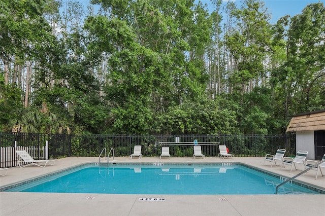 12736 Wood Trail Blvd, Tampa, FL 33625 - pool with a patio and fence