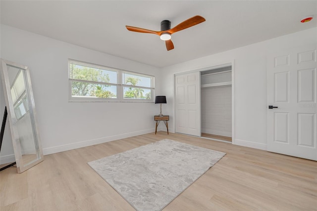 1717 Thames St, Clearwater, FL 33755 - bedroom with a closet, light wood-style floors, and baseboards
