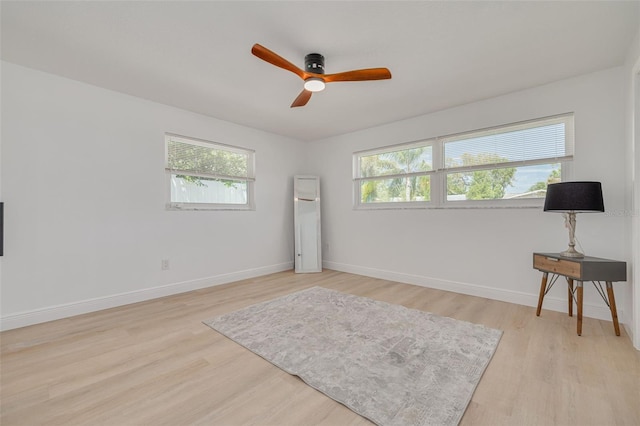 1717 Thames St, Clearwater, FL 33755 - sitting room featuring a wealth of natural light, light wood-style flooring, baseboards, and a ceiling fan