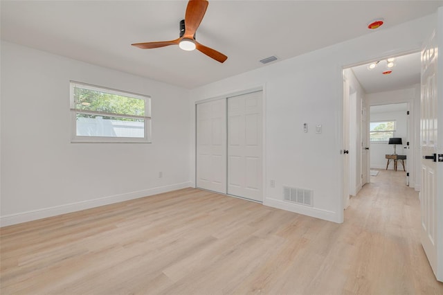 1717 Thames St, Clearwater, FL 33755 - unfurnished bedroom featuring visible vents, light wood-type flooring, and baseboards