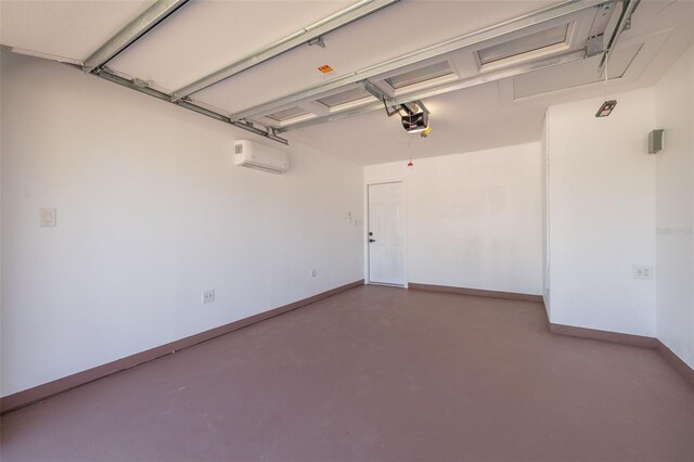 1717 Thames St, Clearwater, FL 33755 - garage featuring a wall mounted AC, baseboards, and a garage door opener