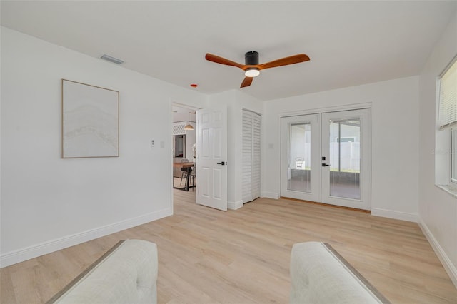 1717 Thames St, Clearwater, FL 33755 - spare room featuring light wood-style floors, ceiling fan, visible vents, french doors, and baseboards