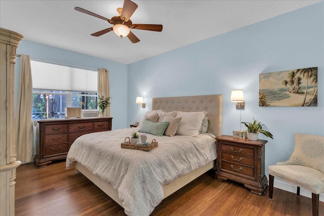 8202 Pinewood Run Ct, Tampa, FL 33647 - bedroom with wood finished floors and a ceiling fan