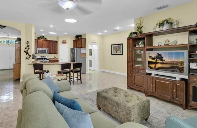 8202 Pinewood Run Ct, Tampa, FL 33647 - living area featuring ceiling fan, baseboards, and recessed lighting