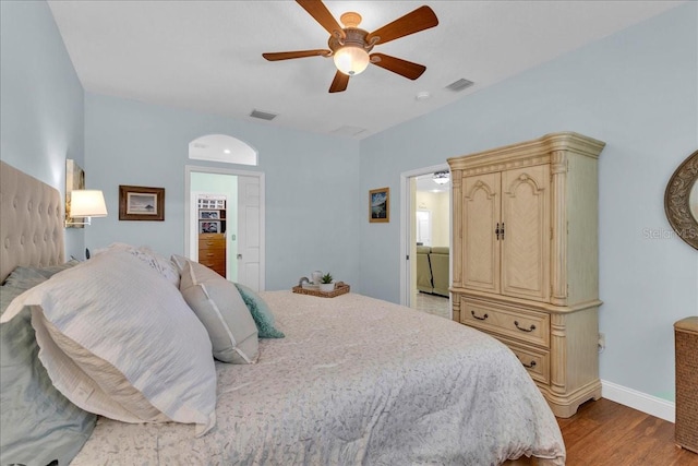 8202 Pinewood Run Ct, Tampa, FL 33647 - bedroom featuring light wood-style floors, baseboards, and ceiling fan