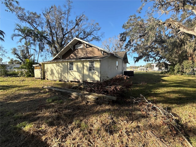 318 N 4th Ave, Wauchula, FL 33873 - view of side of home with a yard