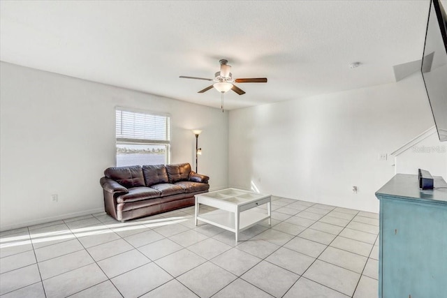 11476 Sage Canyon Dr, Riverview, FL 33578 - living room with light tile patterned floors and a ceiling fan