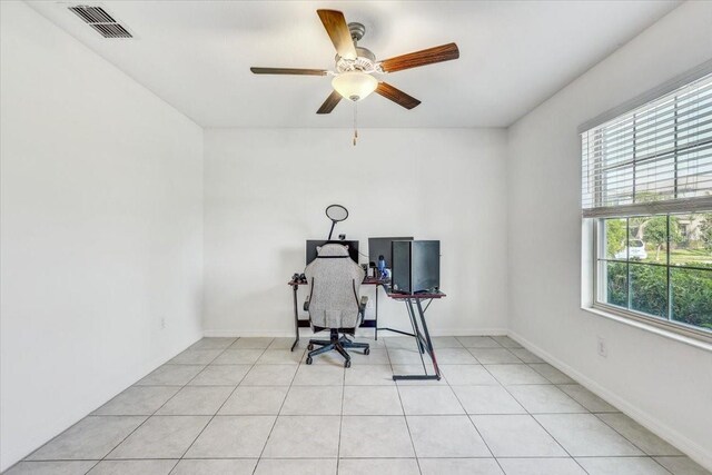 11476 Sage Canyon Dr, Riverview, FL 33578 - office featuring light tile patterned floors, visible vents, a ceiling fan, and a healthy amount of sunlight