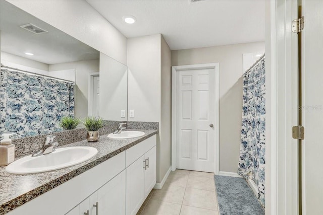 11476 Sage Canyon Dr, Riverview, FL 33578 - full bathroom with a sink, tile patterned floors, double vanity, and curtained shower