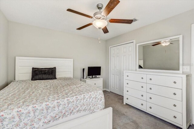11476 Sage Canyon Dr, Riverview, FL 33578 - bedroom with light carpet, a closet, and a ceiling fan