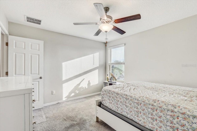 11476 Sage Canyon Dr, Riverview, FL 33578 - bedroom featuring carpet flooring, visible vents, a textured ceiling, and baseboards