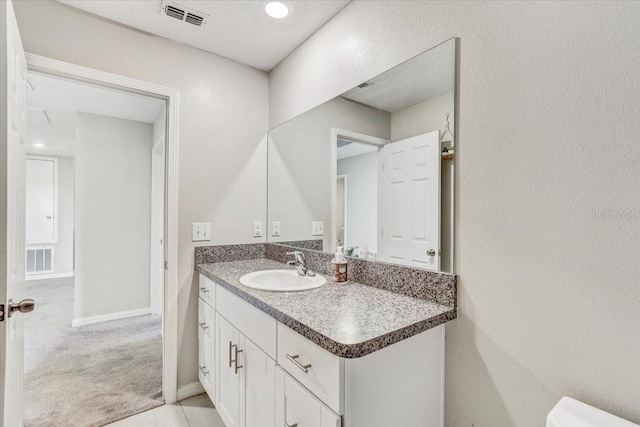 11476 Sage Canyon Dr, Riverview, FL 33578 - bathroom featuring visible vents, baseboards, and vanity