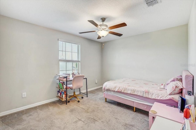 11476 Sage Canyon Dr, Riverview, FL 33578 - carpeted bedroom with visible vents, baseboards, a textured ceiling, and a ceiling fan