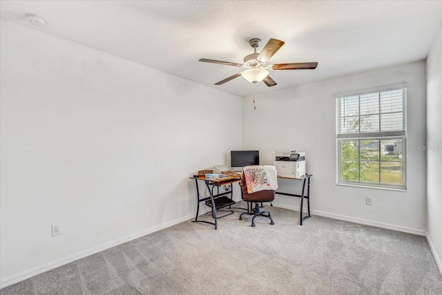 11476 Sage Canyon Dr, Riverview, FL 33578 - carpeted home office featuring baseboards and a ceiling fan