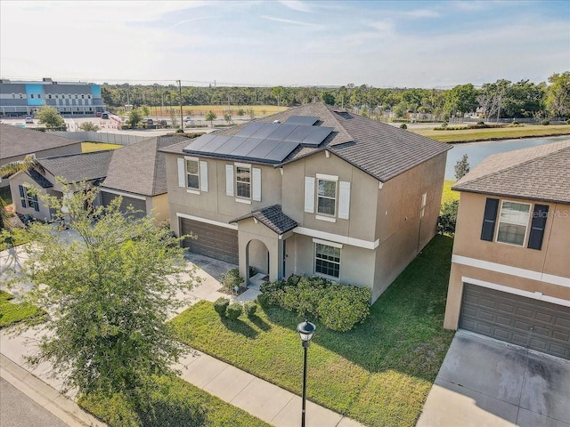 11476 Sage Canyon Dr, Riverview, FL 33578 - view of front of property featuring an attached garage, stucco siding, and concrete driveway