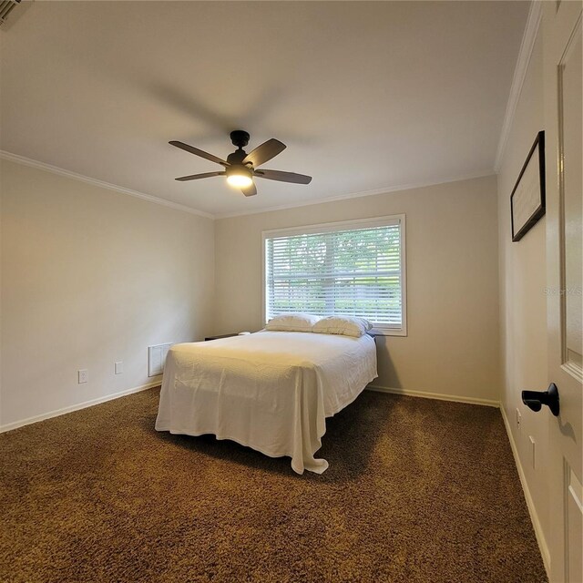 213 Sheffield Cir E, Palm Harbor, FL 34683 - carpeted bedroom with crown molding and a ceiling fan