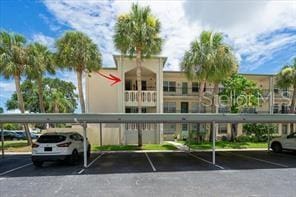 11720 Park Blvd Unit 301, Seminole, FL 33772 - view of covered parking lot